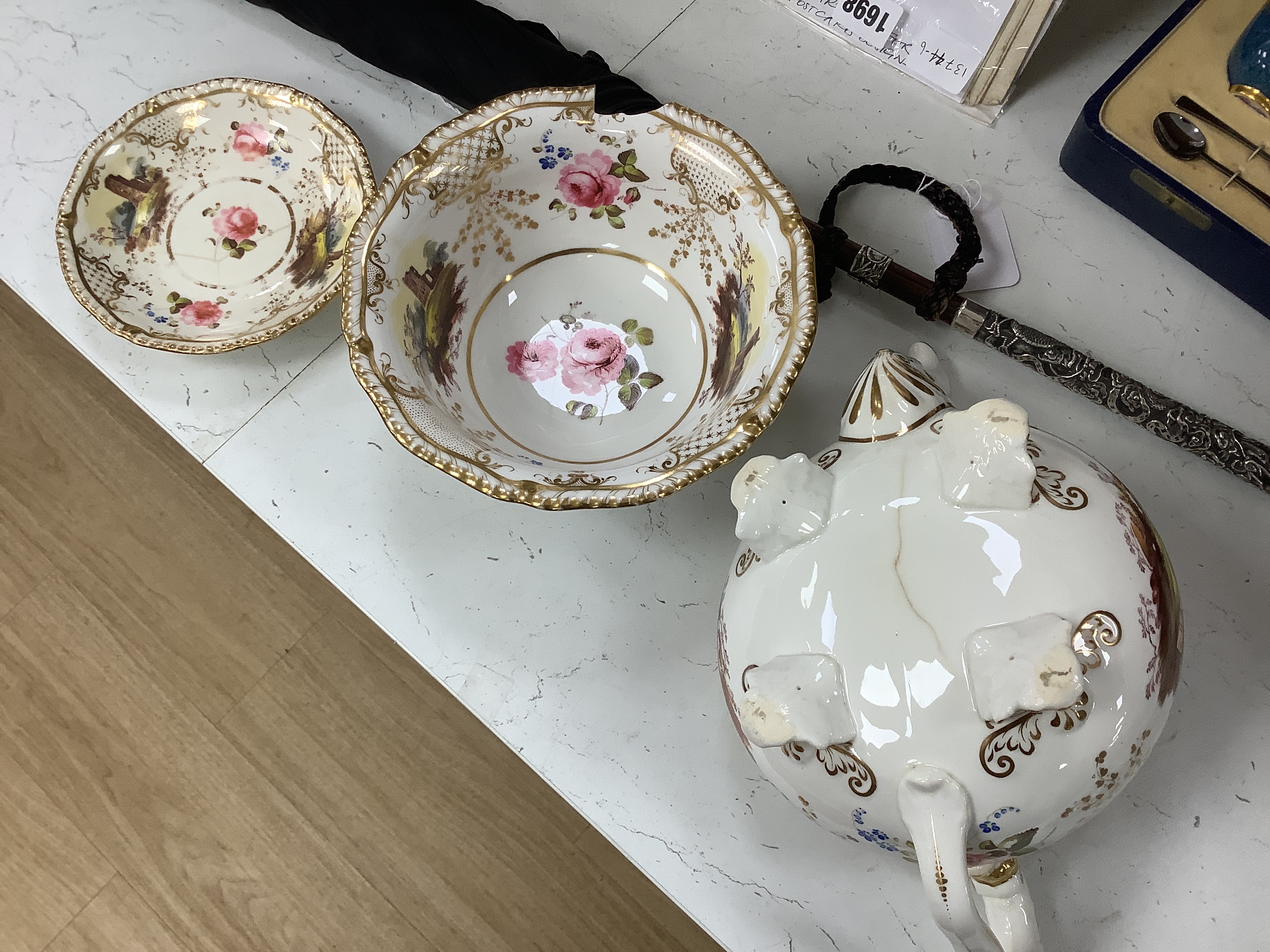 An early 19th century H & R Daniel landscape painted tea and coffee set, including twelve tea cups and saucers, twelve coffee cups, a teapot, a jug and a covered serving bowl, teapot 15cm high